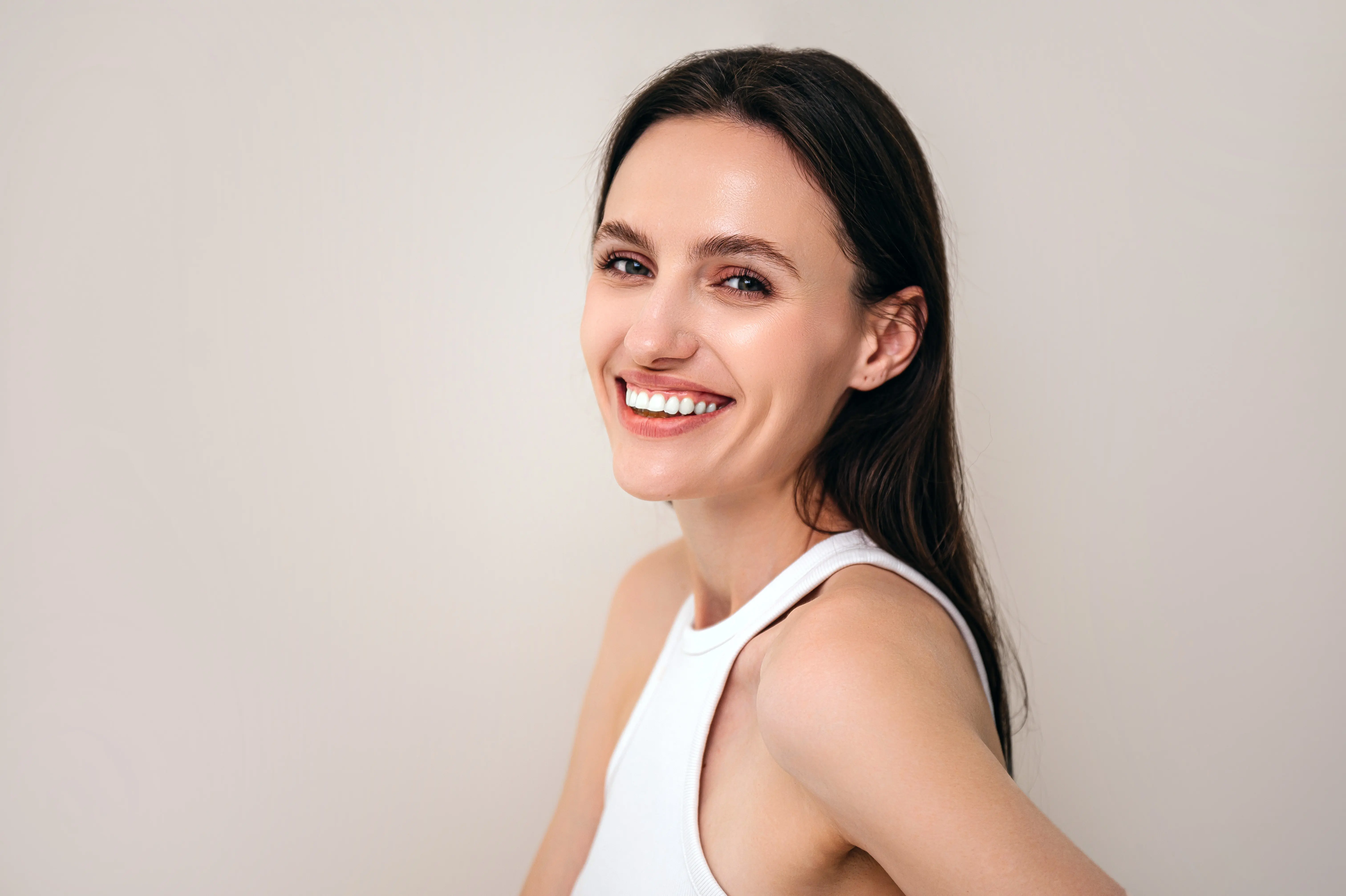 A woman with a smile on her face.