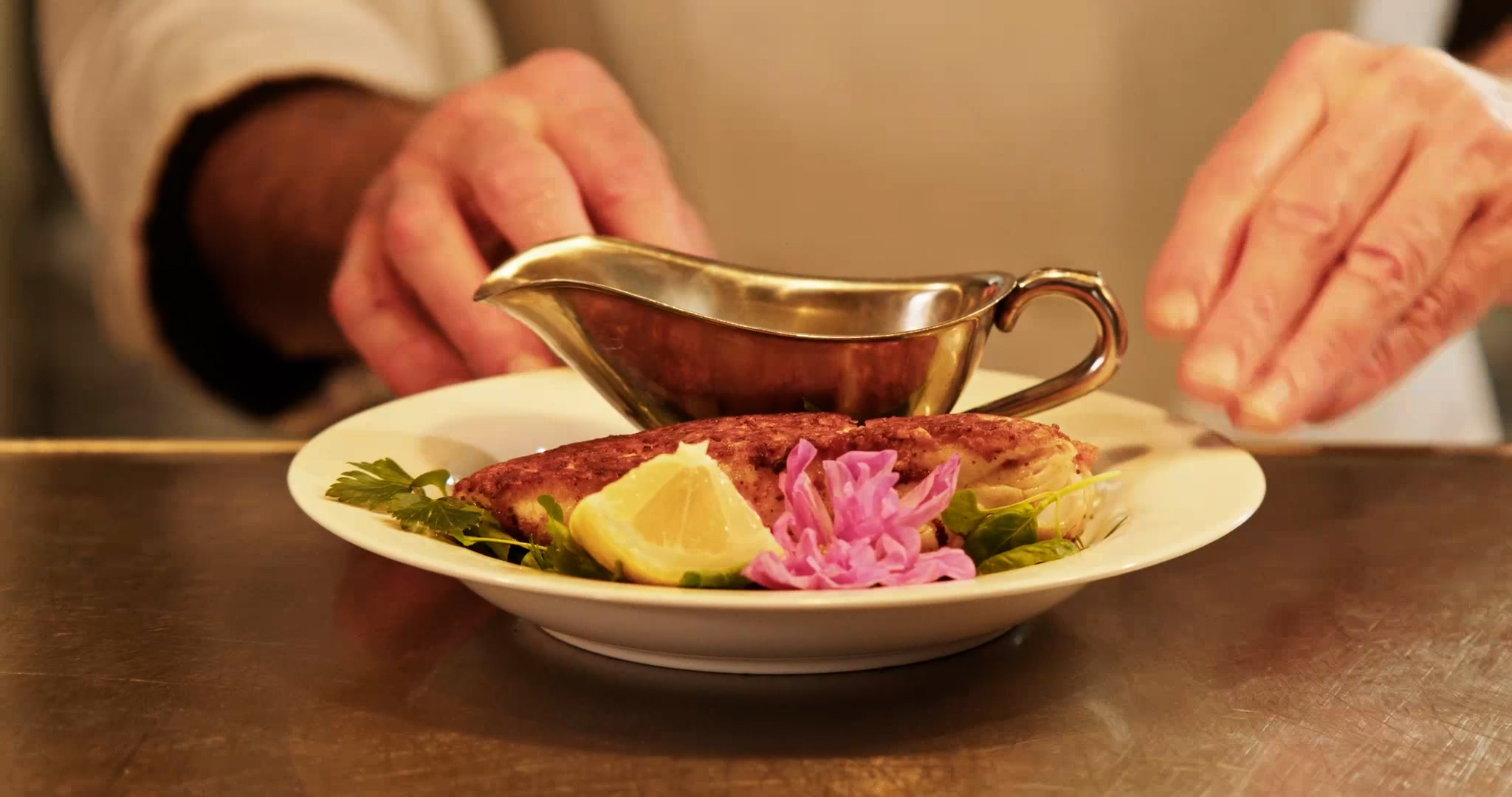 Halibut being served for dinner at Gatsby's Wine Cafe & Steakhouse in Canon Beach, oregon