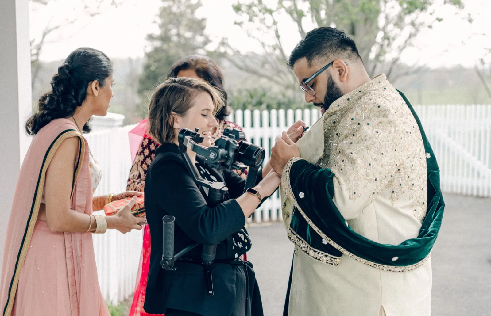 Charlottesville wedding videographer Brandi Hall capturing authentic moments while working with a couple during their wedding celebration.