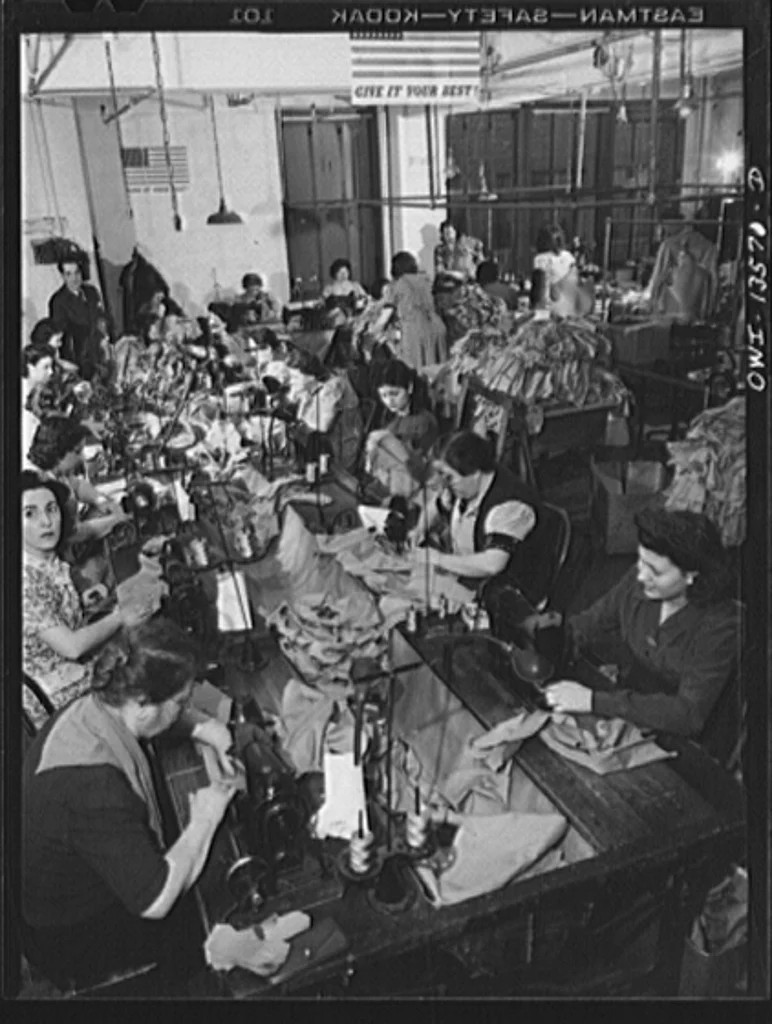 Garment workers in the N.M. dress shop which is now making uniforms for the Women's Army Auxiliary Corps 1943