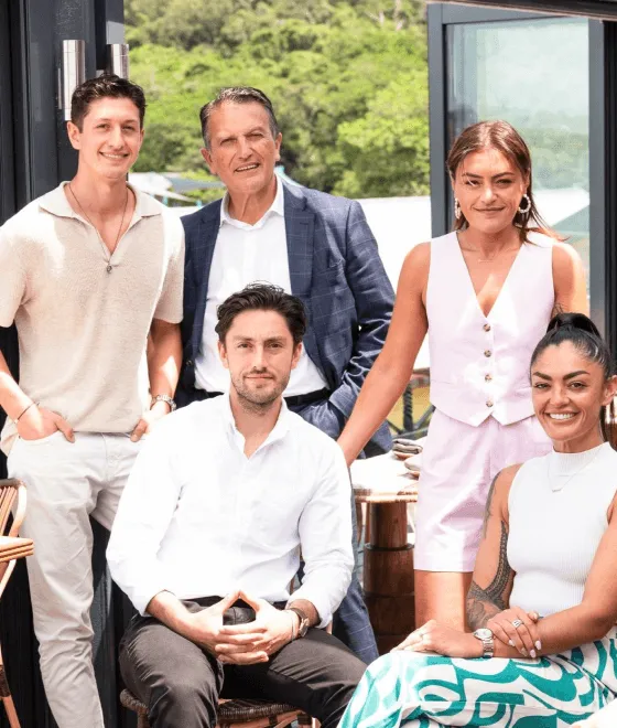 The team behind Akti Greek restaurant at Woolloomoolloo Wharf in Sydney, photographed in front of the waterfront venue