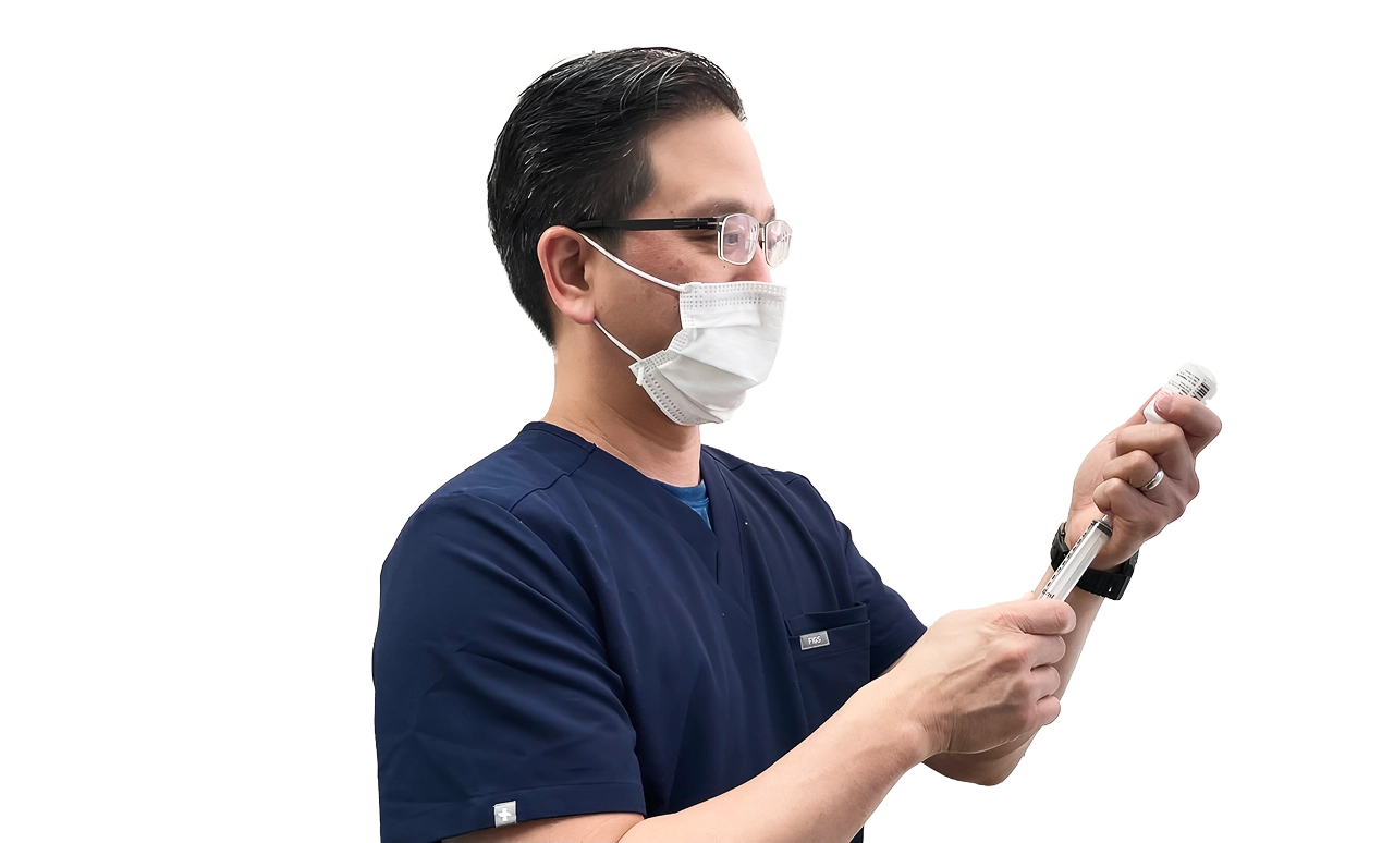 Dr. Marn Preparing Syringe for Injection