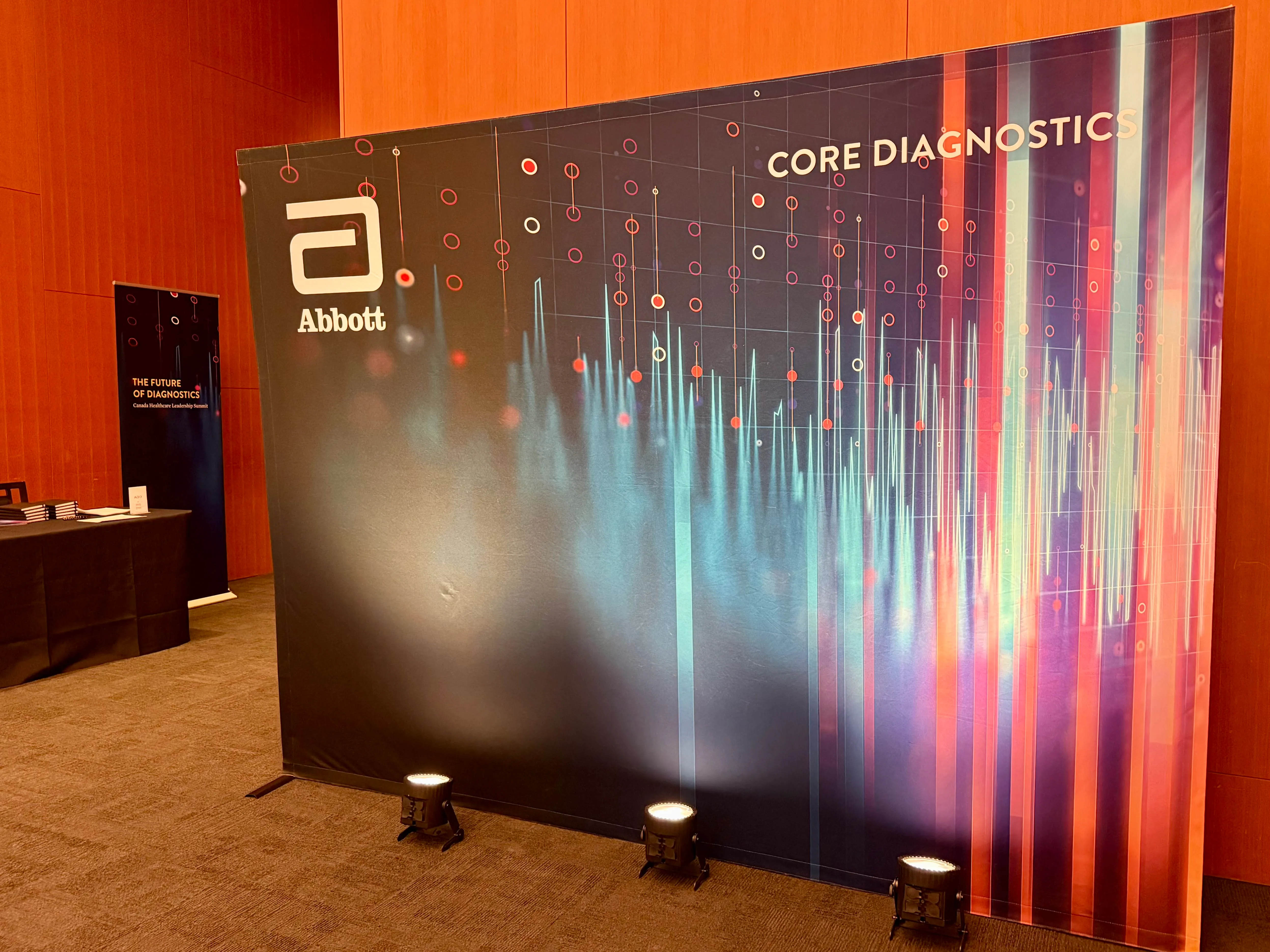 Abbott-branded media wall printed for corporate event at the Art Gallery of Ontario