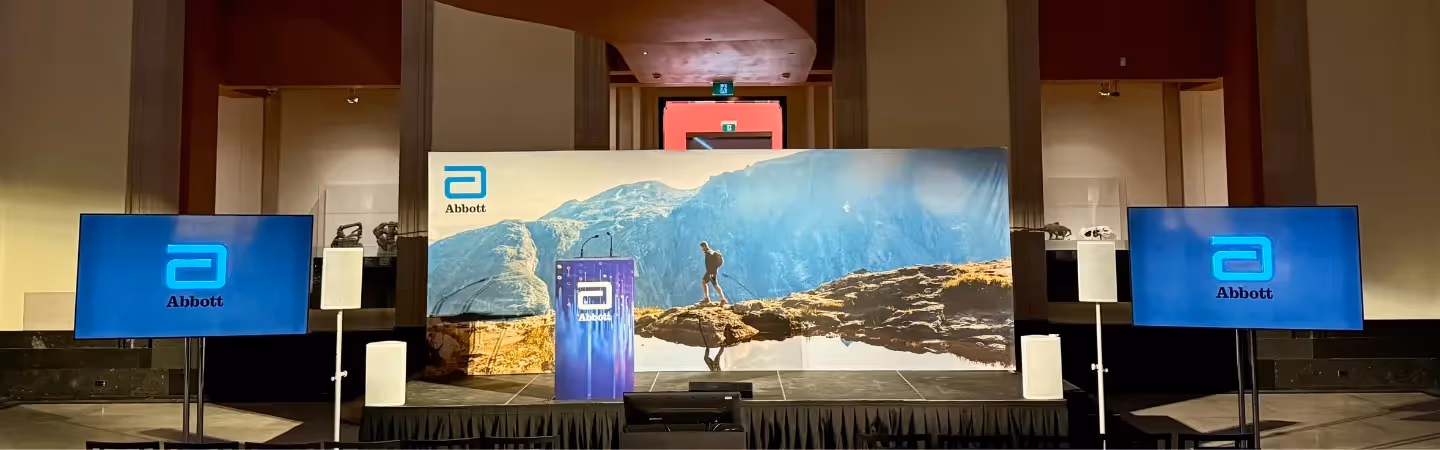 Abbott-branded media wall printed for corporate event at the Art Gallery of Ontario