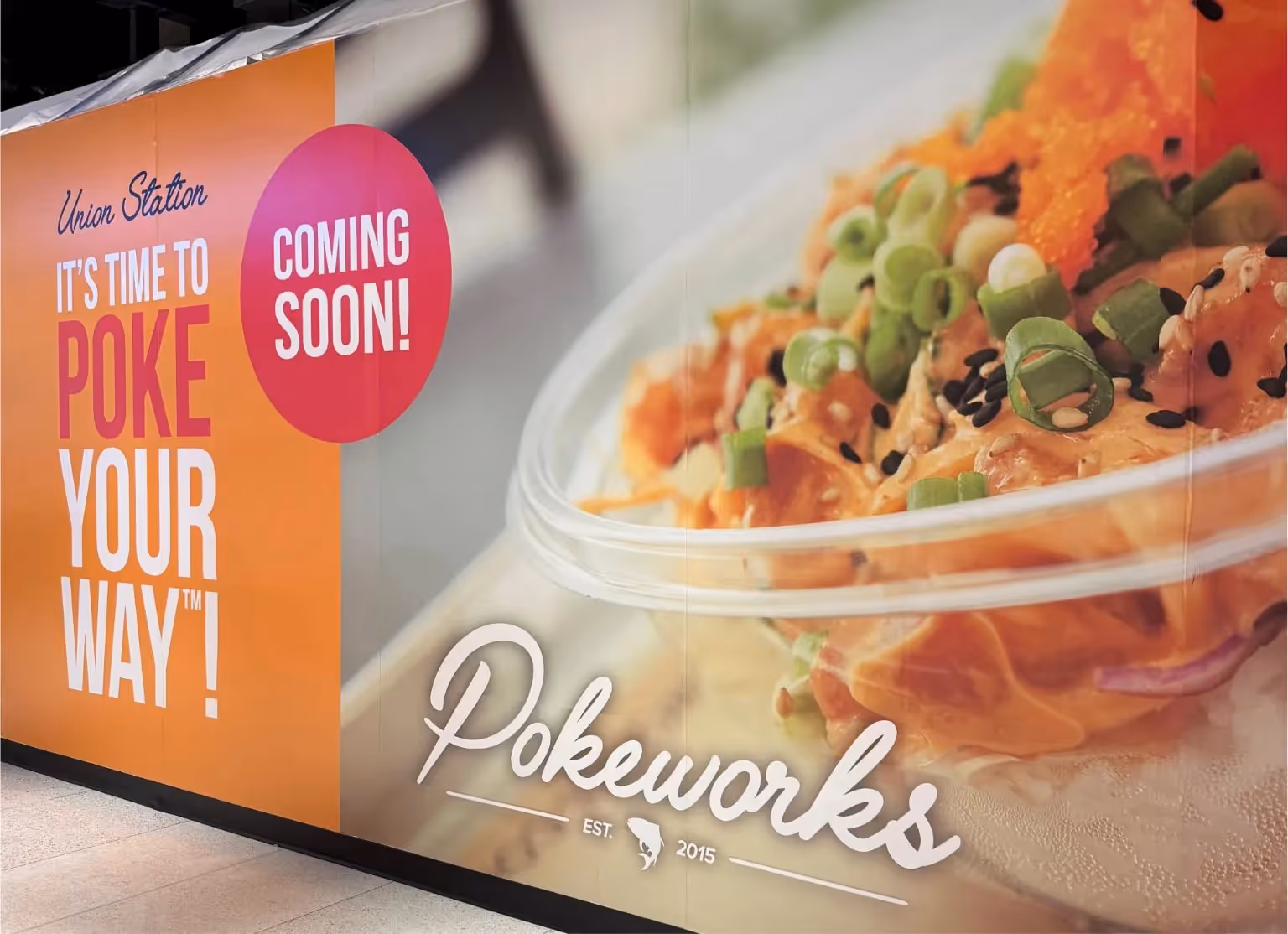 High-impact hoarding installation in Toronto commuter hub Union Station for Pokeworks