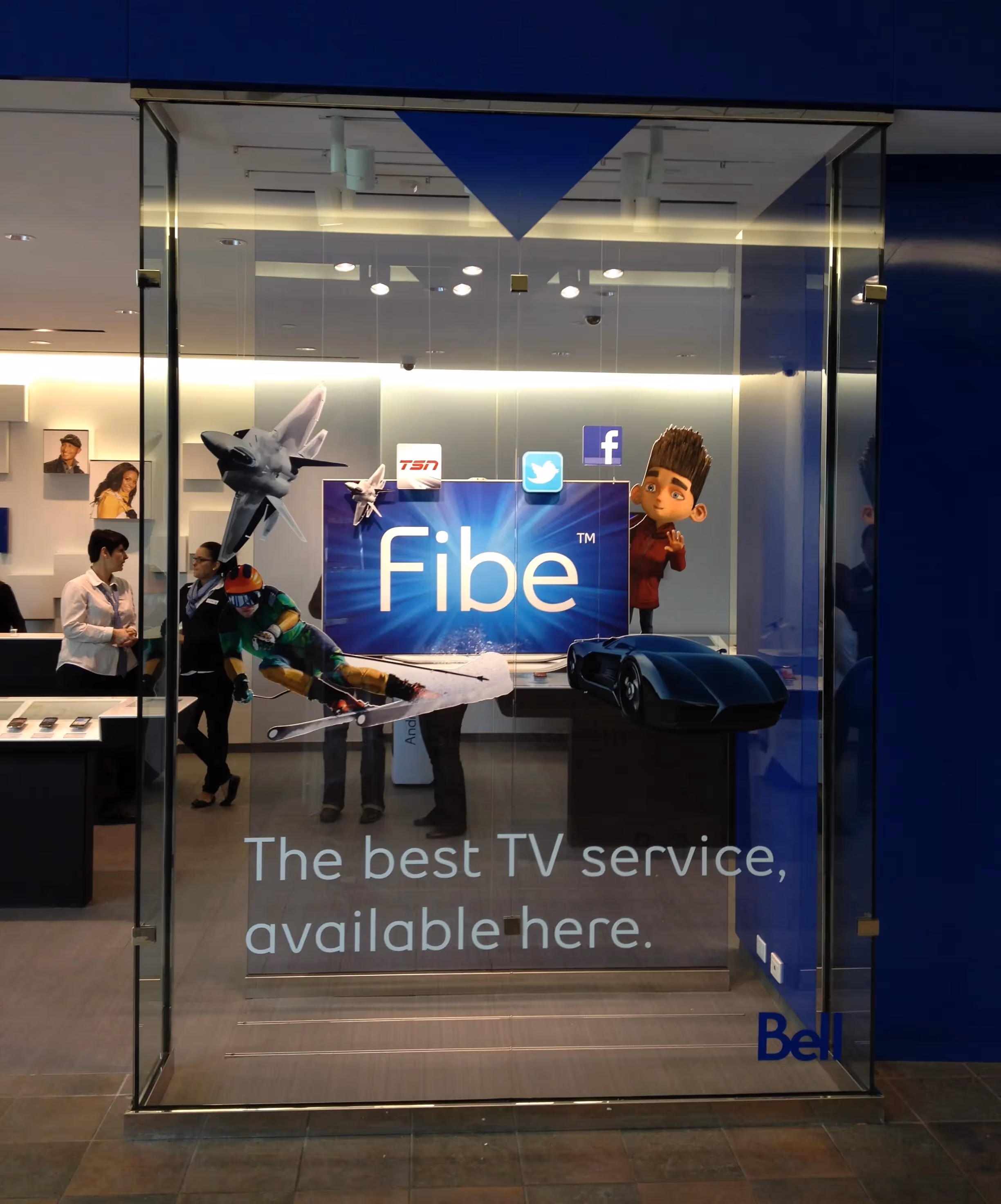 Bell Fibe TV promotional window decals installed by Resource Integrated at Lime Ridge Mall.