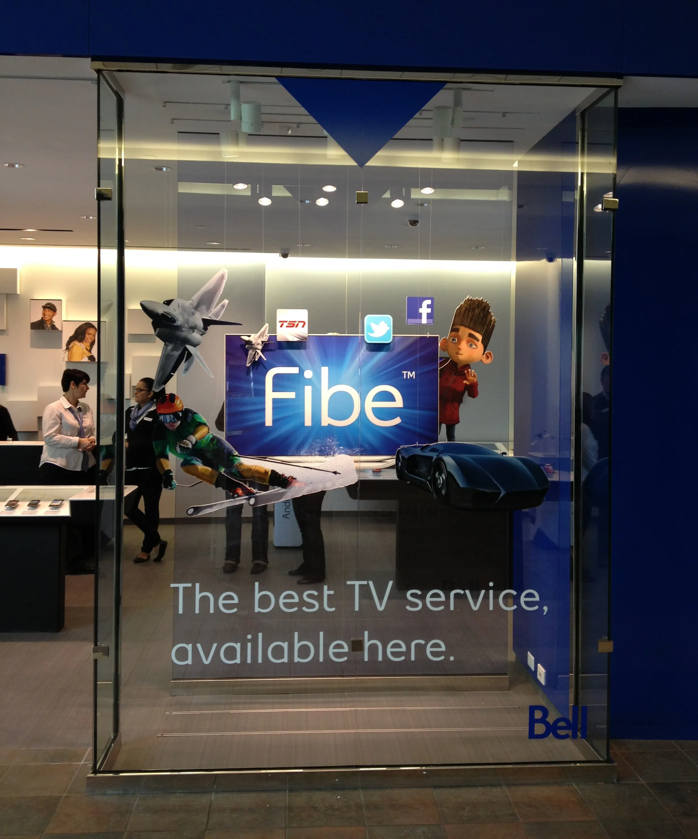Bell Fibe TV promotional window decals installed by Resource Integrated at Lime Ridge Mall.