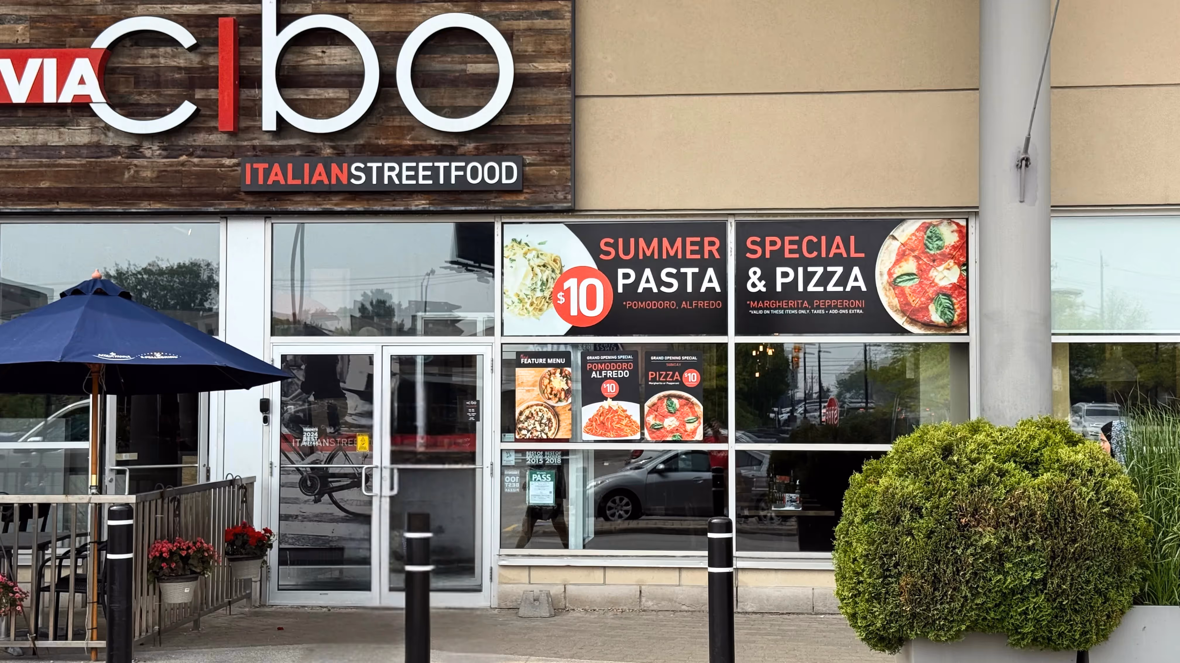Via Cibo restaurant "Summer Special" window decals installed by Resource Integrated at York Mills in 2025.