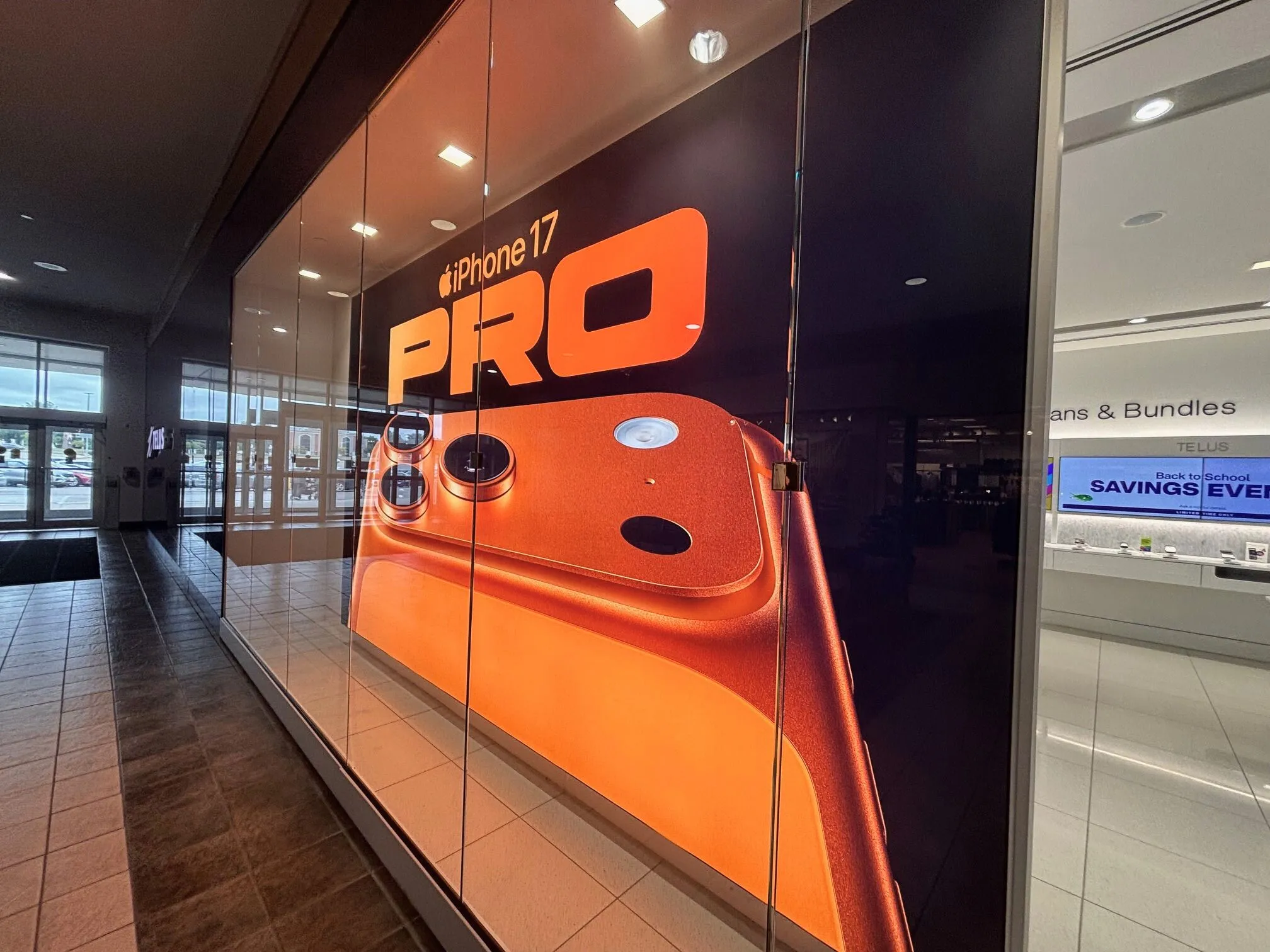 Resource Integrated delivered illuminated SEG lightboxes across TELUS stores nationwide for the iPhone 17 launch