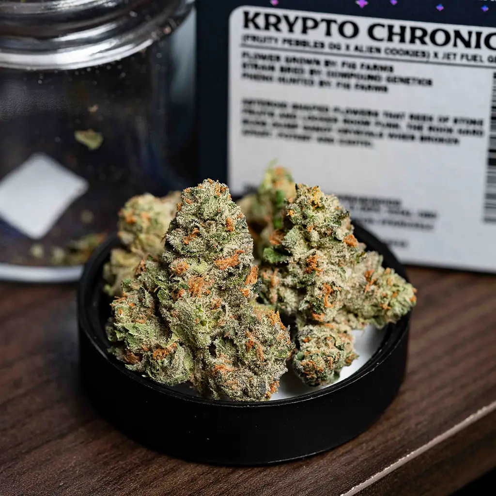 Deep light green and orange hairs of cannabis flower, Krypto Chronic strain.