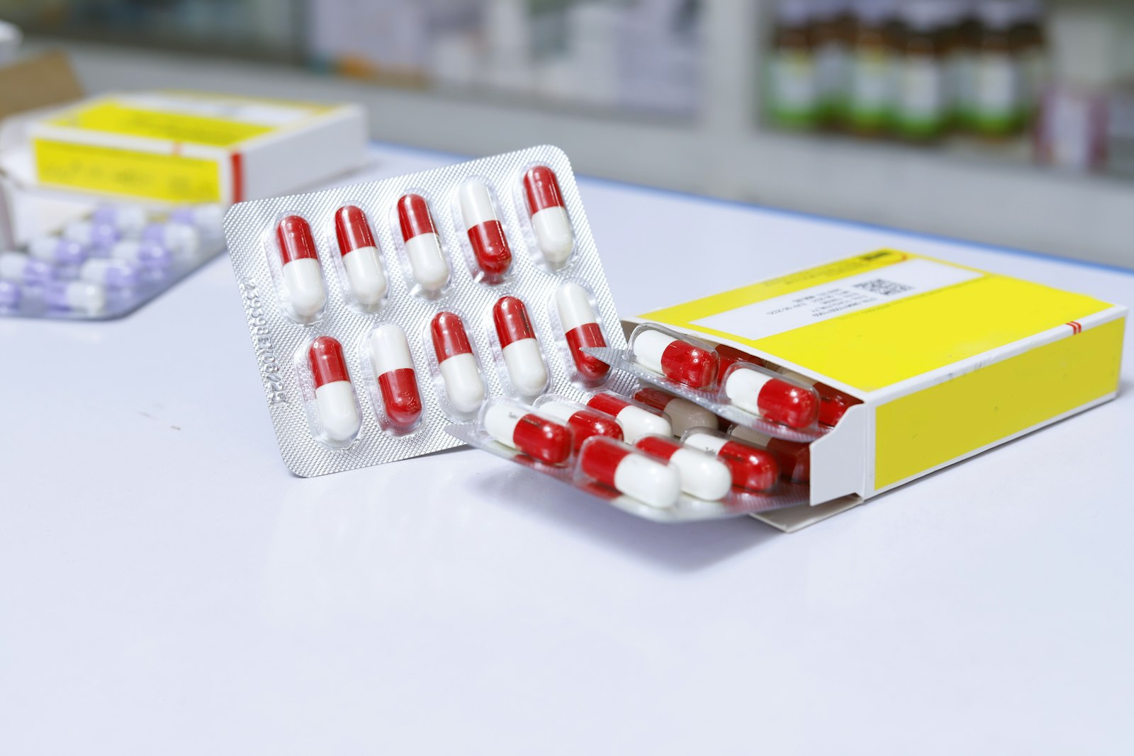 White and red medication blister pack