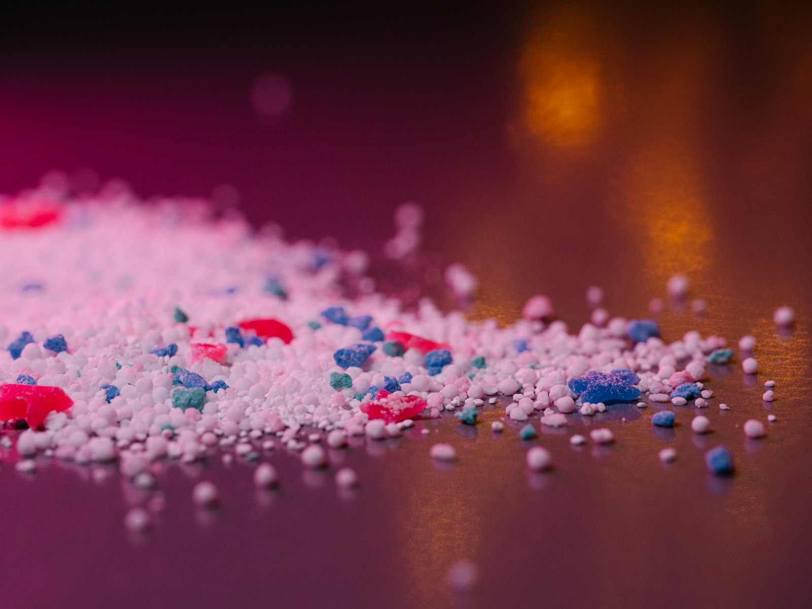 Close-up of plastic resin granules used in HDPE molding
