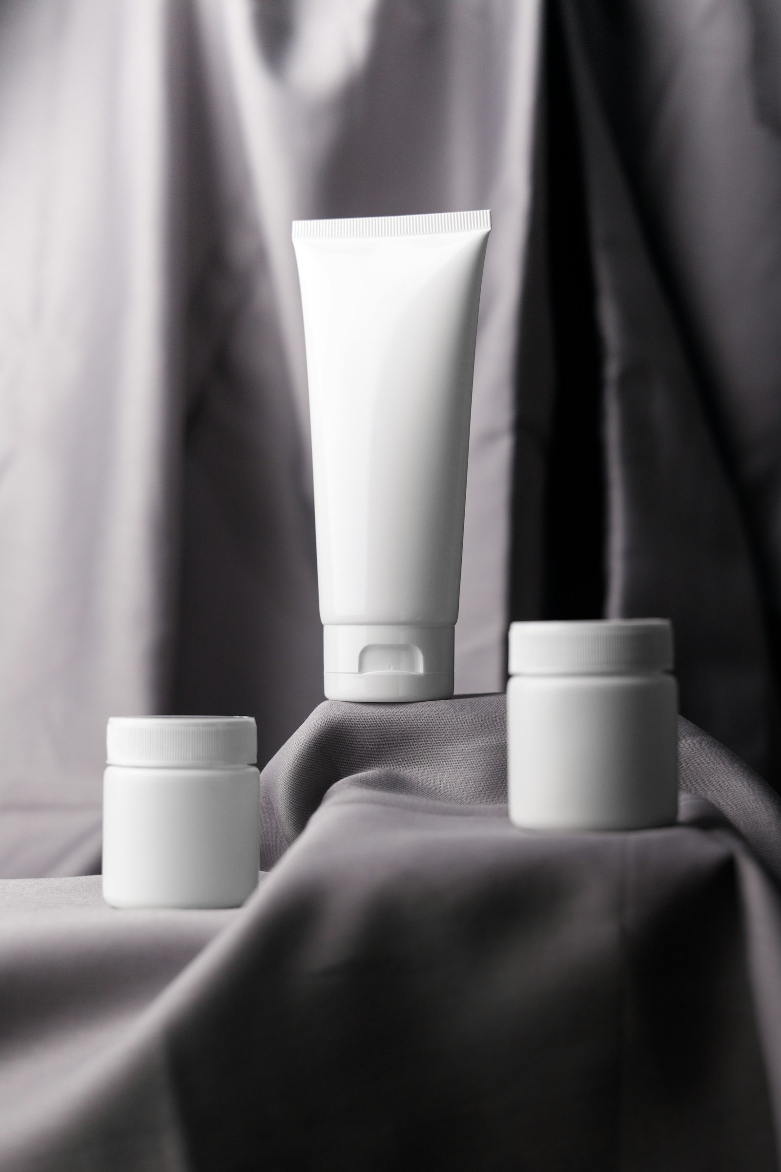 A couple of white containers sitting on top of a table