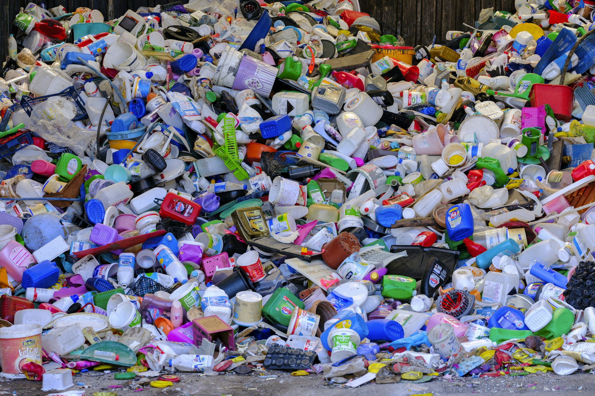 Pile of plastic bottles collected for recycling at a sorting facility
