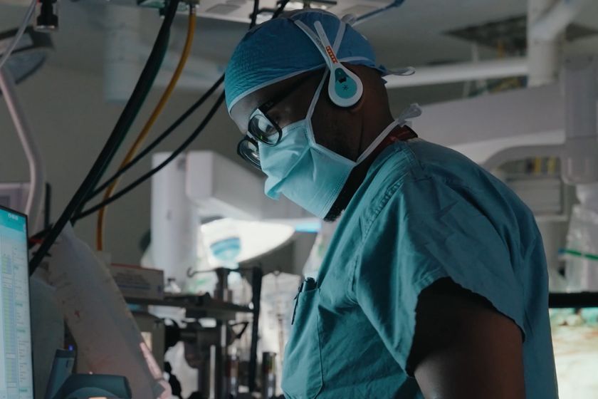 Healthcare team member utilising the headset in a separate room to the surgery