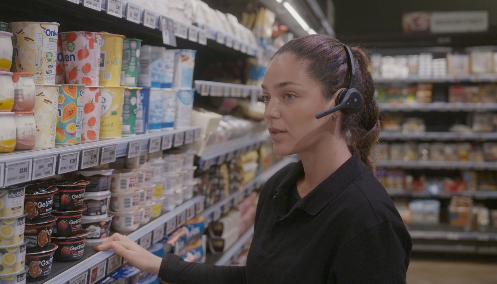 Retail Staff Member Wearing Quail Digital Retail Headsets