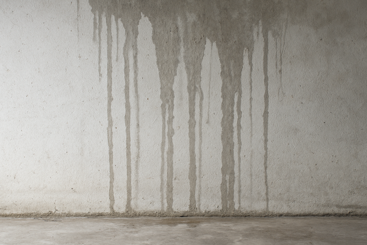 Illustration for Step-by-Step Garage Fixes for Drywall, Concrete, and Epoxy related to water streaks on wall