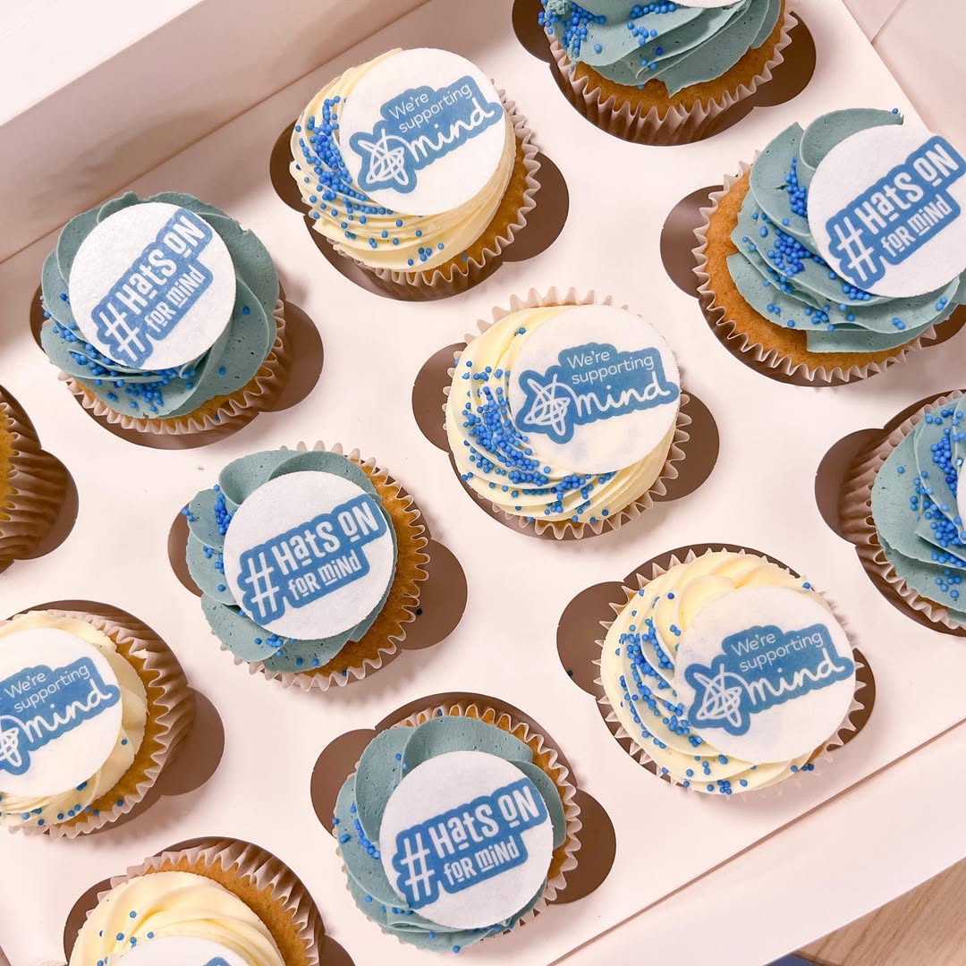 Custom branded cupcake icing toppers for Mind Charity. Custom edible branding for a charity campaign event.