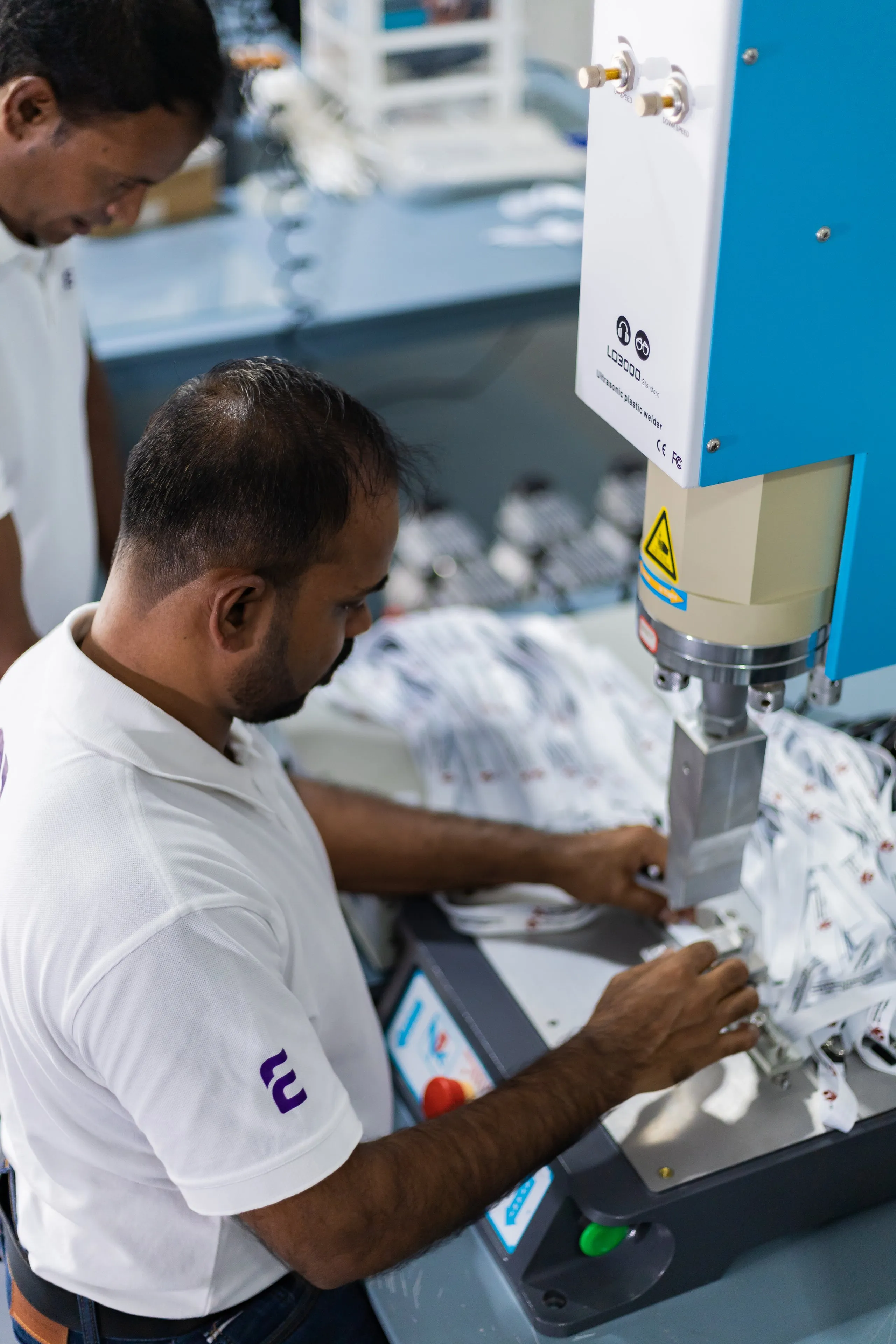 Workers at Lanyardy manufacturing Lanyards, badges and wristbands