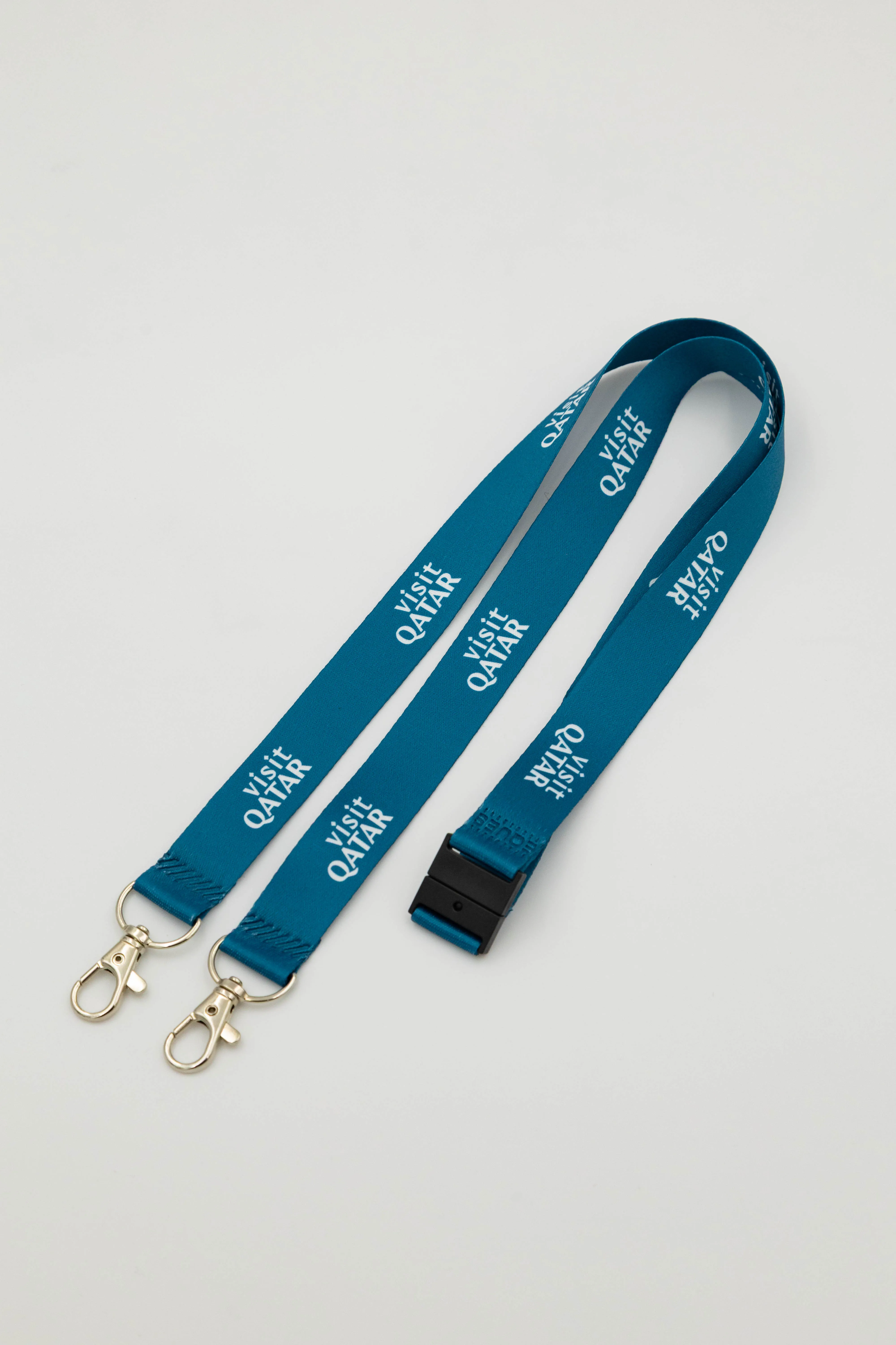 Durable printed lanyard with safety breakaway clasp