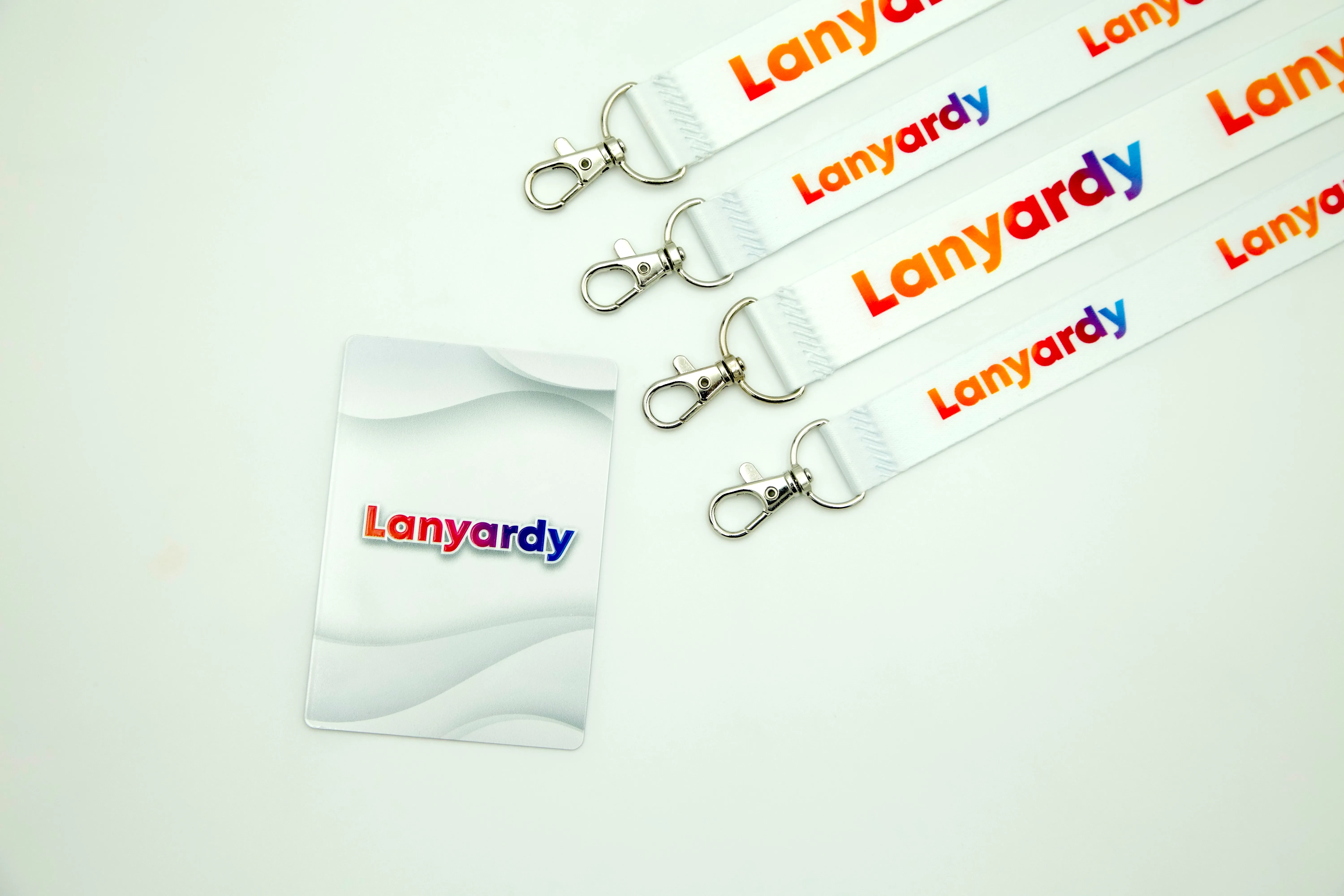 Custom printed lanyard with attached premium event badge for staff identification
