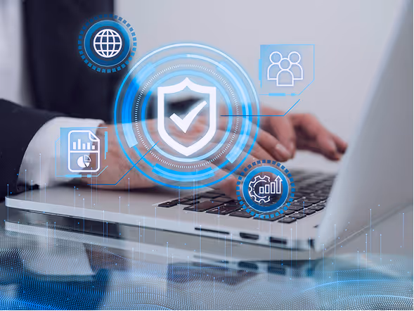 A business professional using a laptop with digital security and data protection icons overlaid, symbolizing cyber resilience, risk management, or compliance.