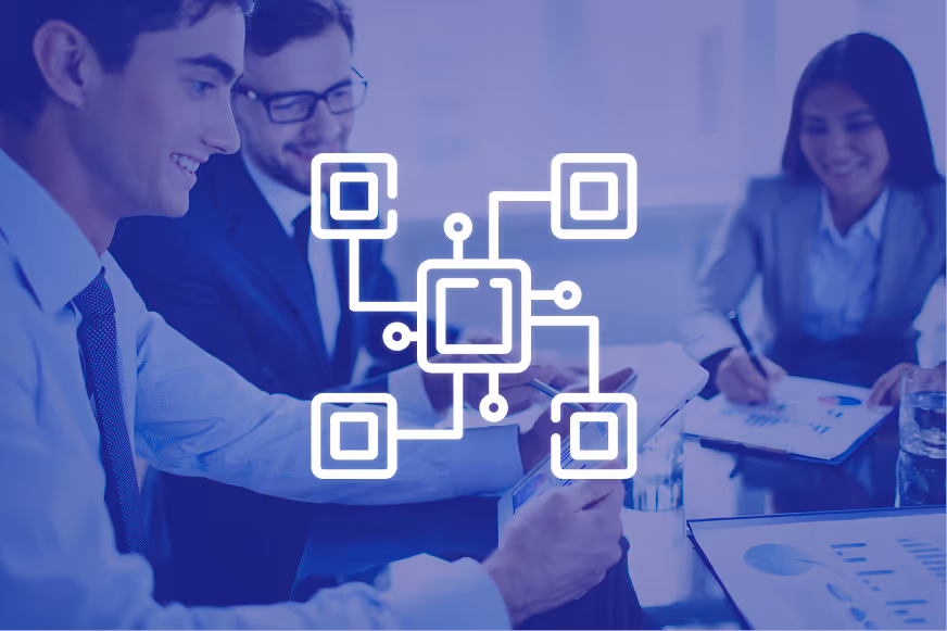 A group of people working at a desk, overlaid with a white network icon connected to multiple nodes, suggesting technology, networking, or digital systems integration.