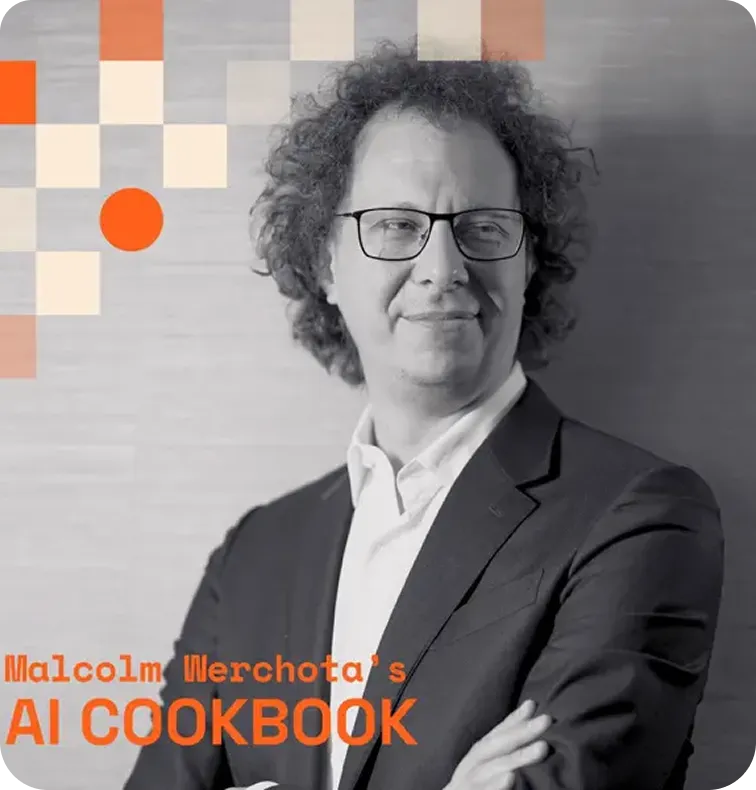 Portrait of a man with curly hair and glasses, dressed in a suit, with text reading 'Malcolm Werchota's AI COOKBOOK' in orange.