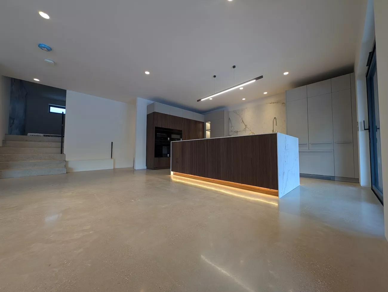 Residential polished concrete kitchen floor.