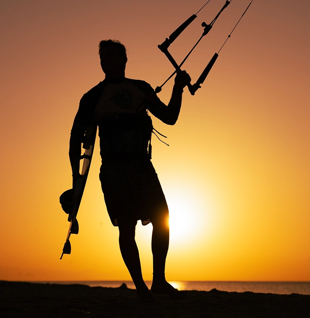 Kitesurfing during sunset on the Red Sea in Egypt 