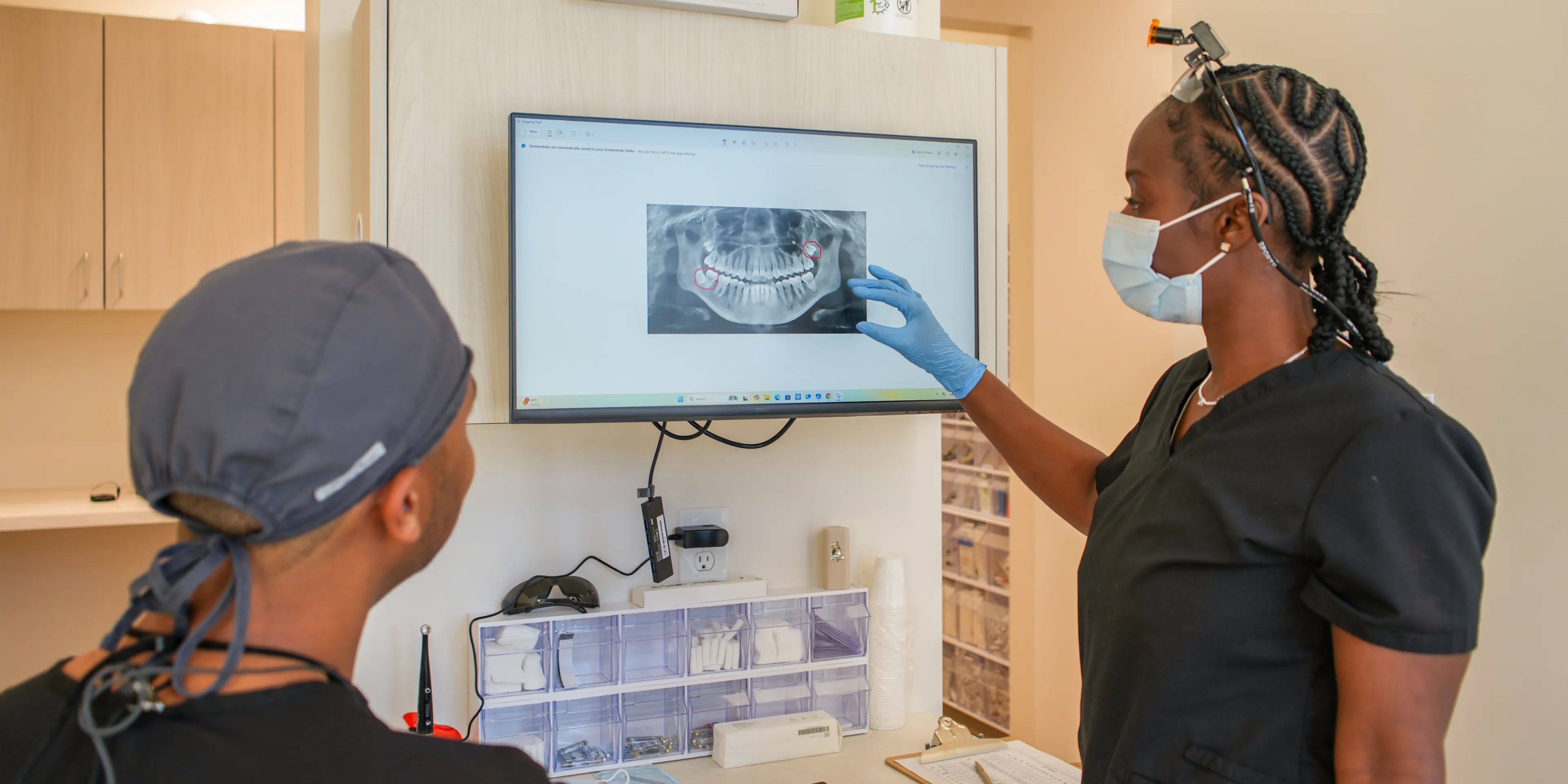 Kenner Dental Company team showing x-ray image