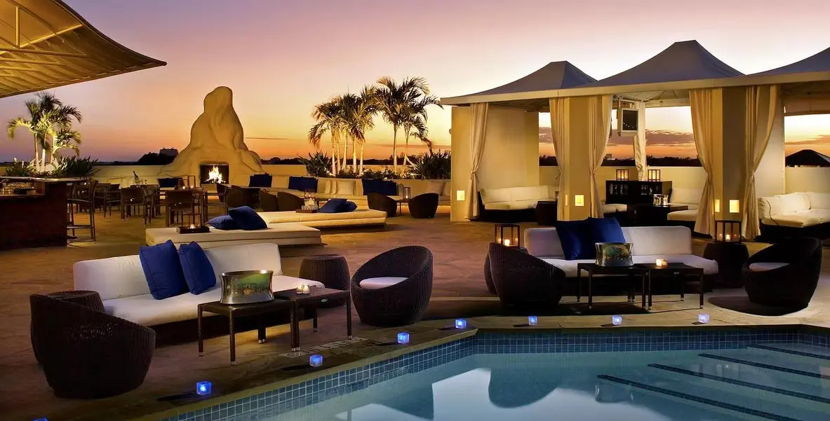 Gorgeous hotel poolside in twilight.