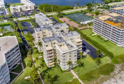 Aerial of beachfront hotel condimumium.