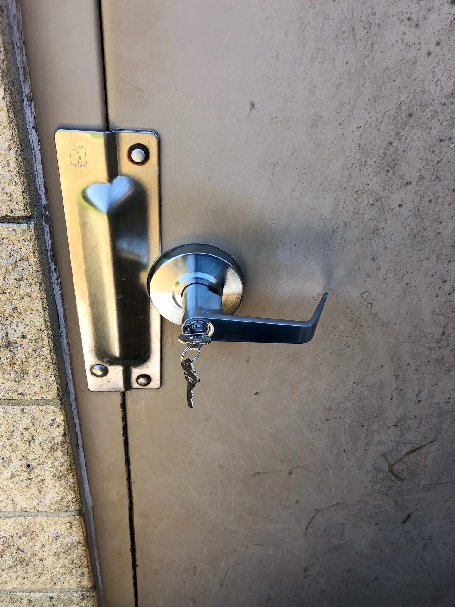 Open white metal cabinet with lock system – Secure file cabinet and storage lock service for offices and commercial properties