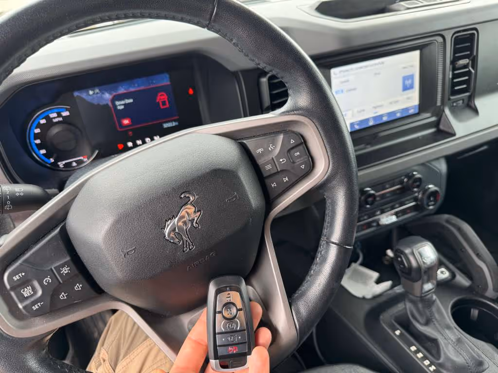 Car key fob programmed inside Ford vehicle – automotive key replacement and programming