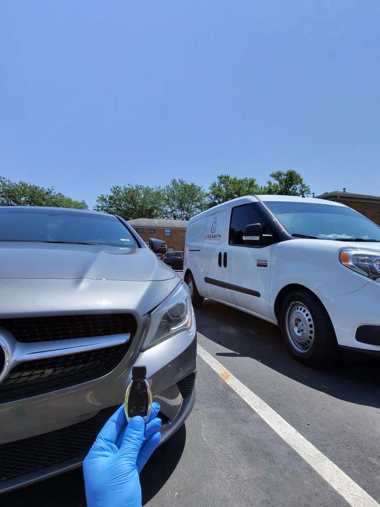Locksmith van and Mercedes car