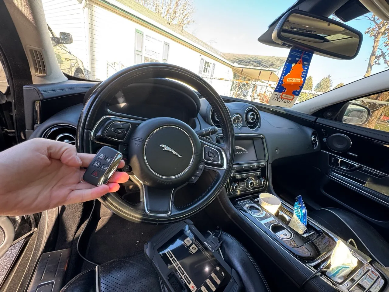 Smart key programming for Jaguar vehicle by mobile locksmith in Columbus, OH.