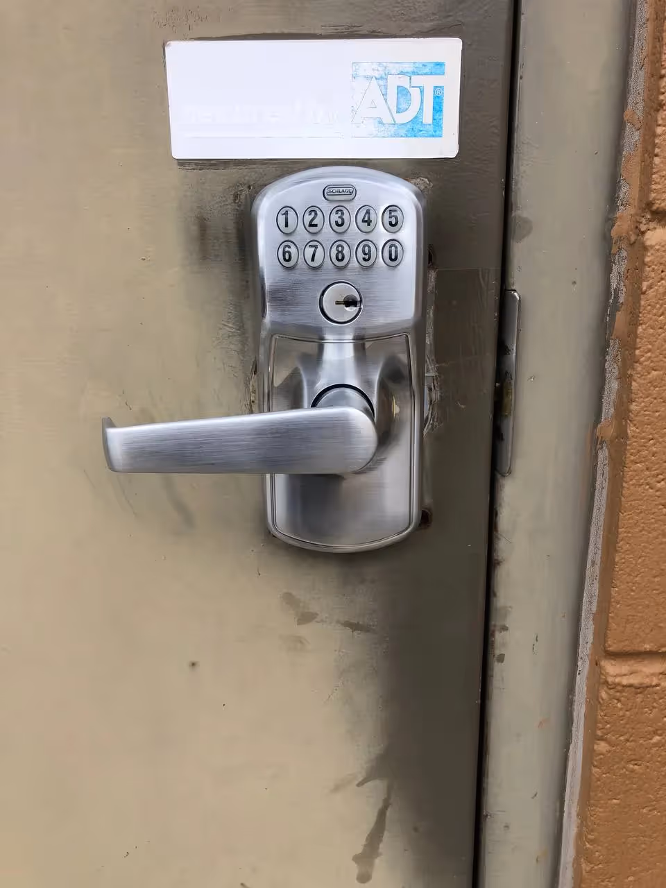 Electronic keypad door lock on commercial metal door