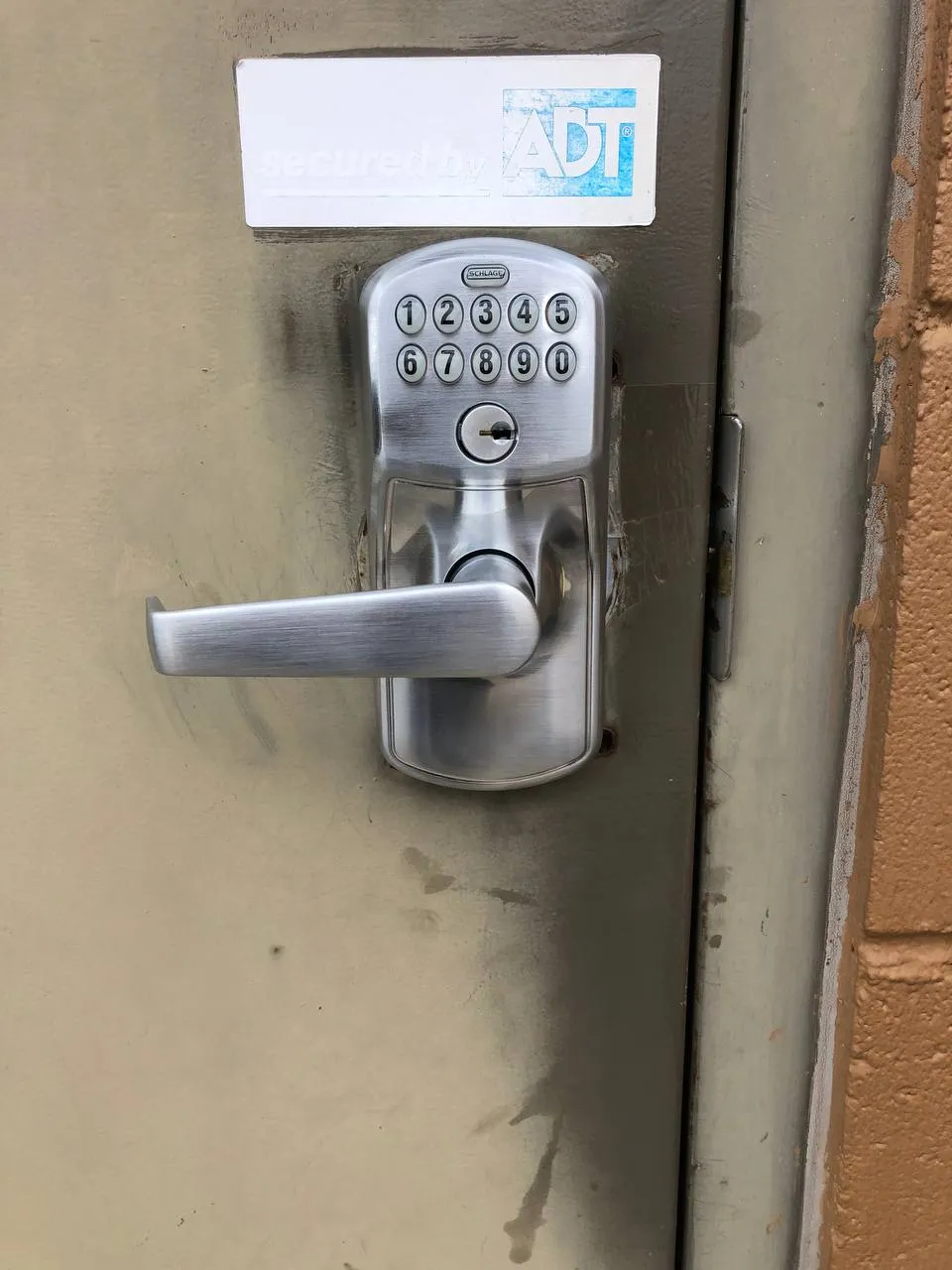 Electronic keypad door lock on commercial metal door