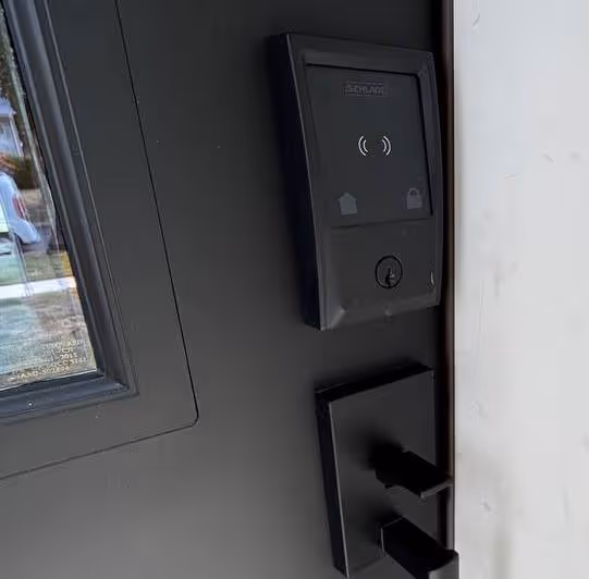 Smart lock installation on modern front door
