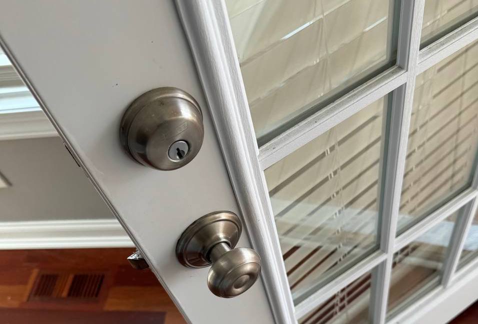 Double-cylinder deadbolt installed on glass patio door