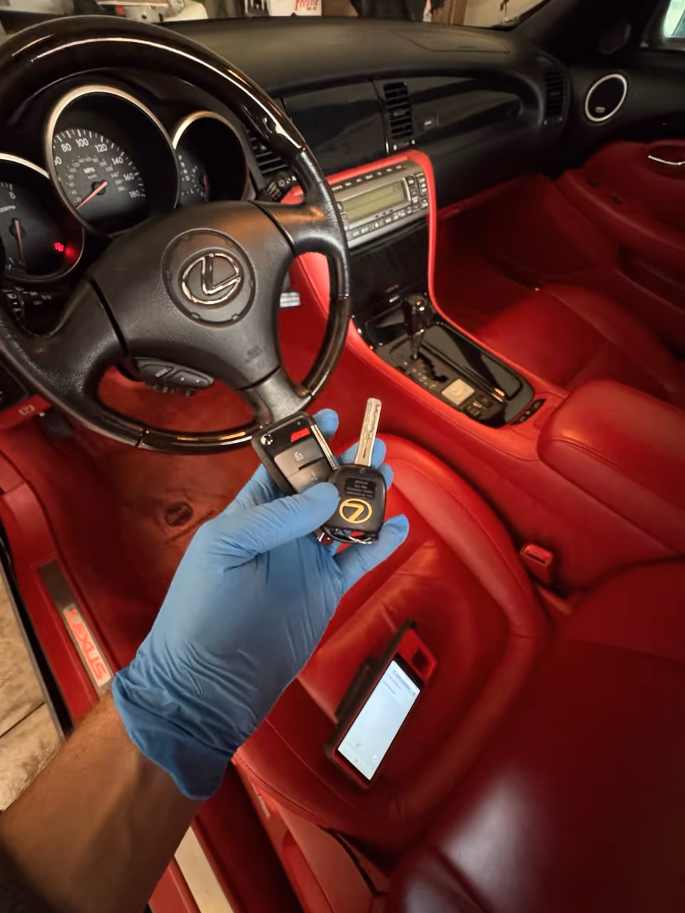 Close-up of push-to-start ignition button in modern vehicle – Push-to-start system support and key fob troubleshooting in Columbus, OH