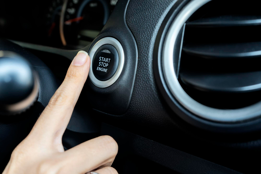 Close-up of push-to-start ignition button in modern vehicle – Push-to-start system support and key fob troubleshooting in Columbus, OH