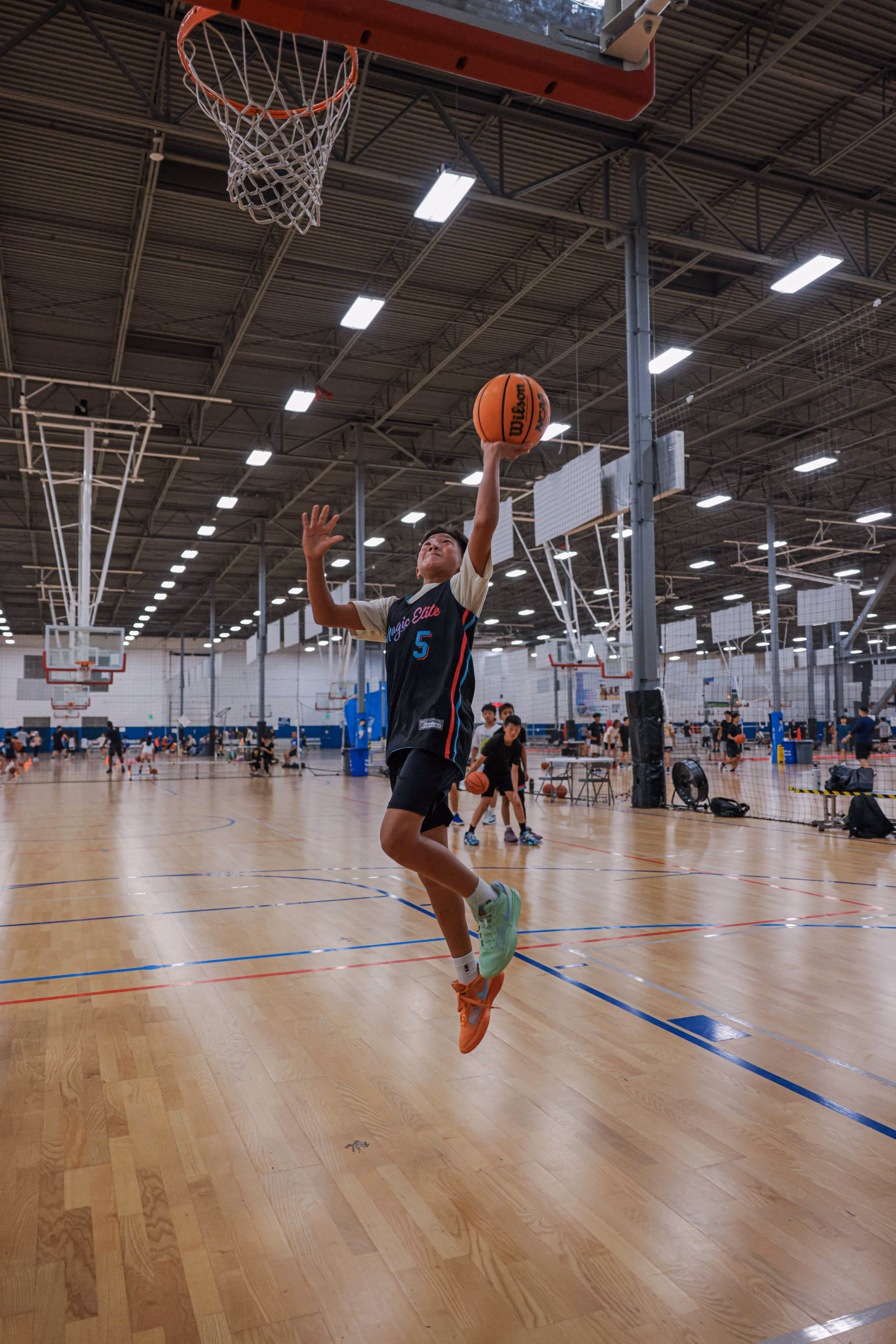 A child playing basketball