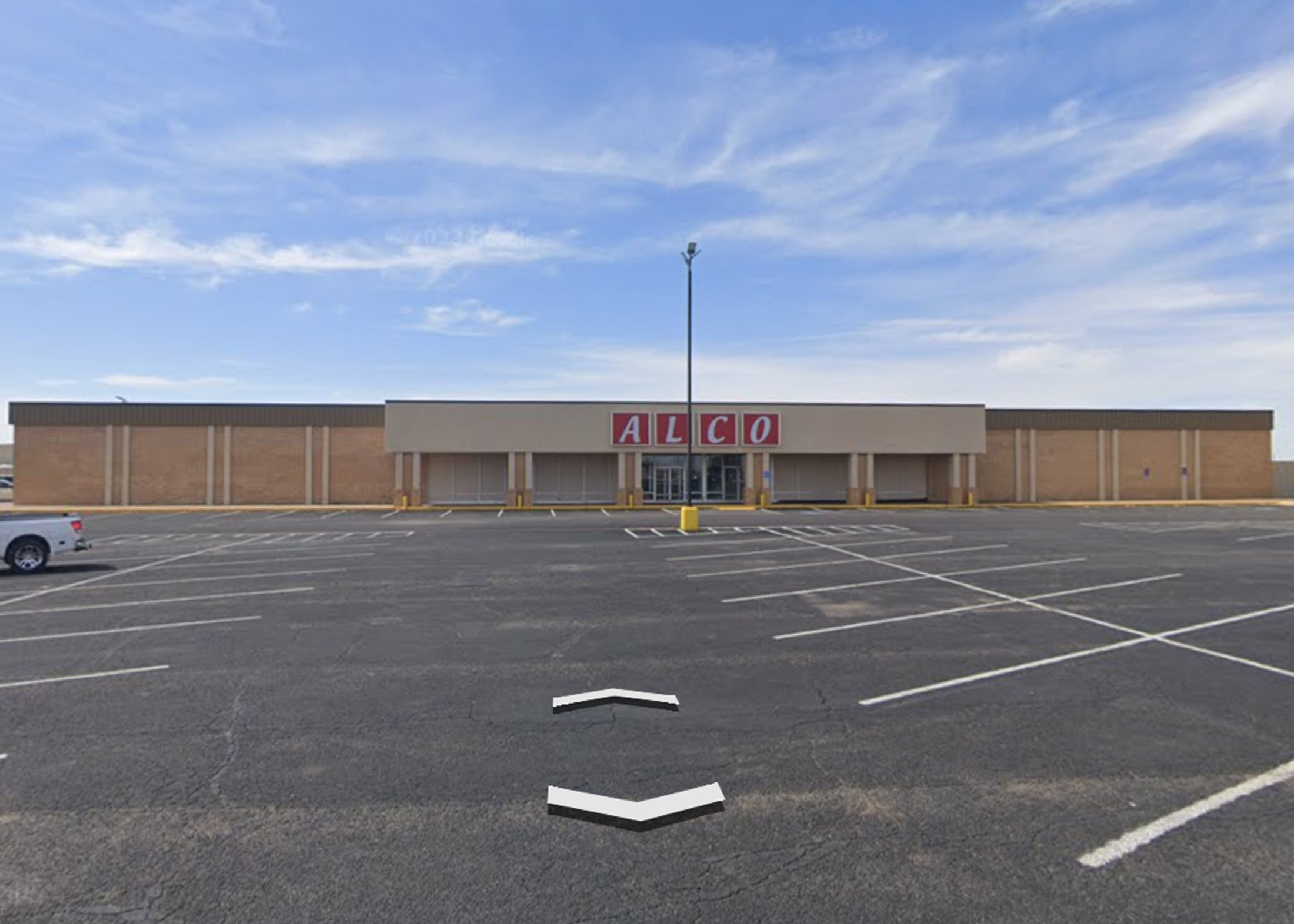 Wide view of the former Alco building at Slaton Plaza in Slaton, Texas