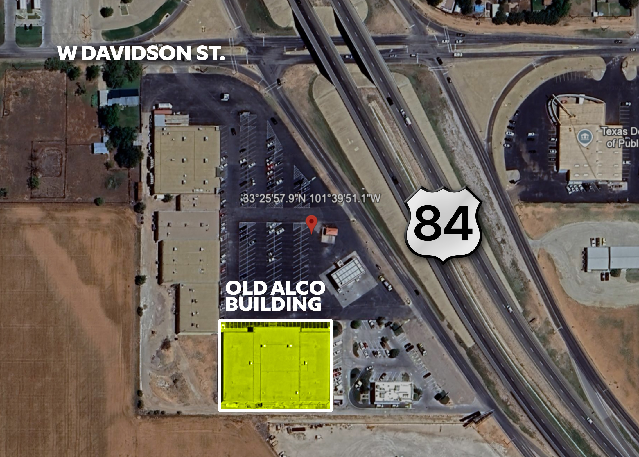 Building outline of the former Alco at Slaton Plaza in Slaton, Texas