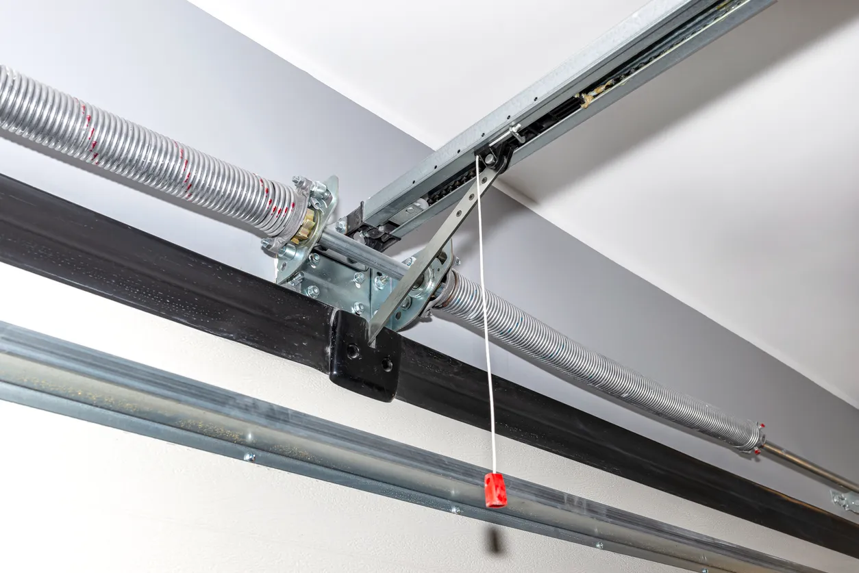 A close shot of garage door spring