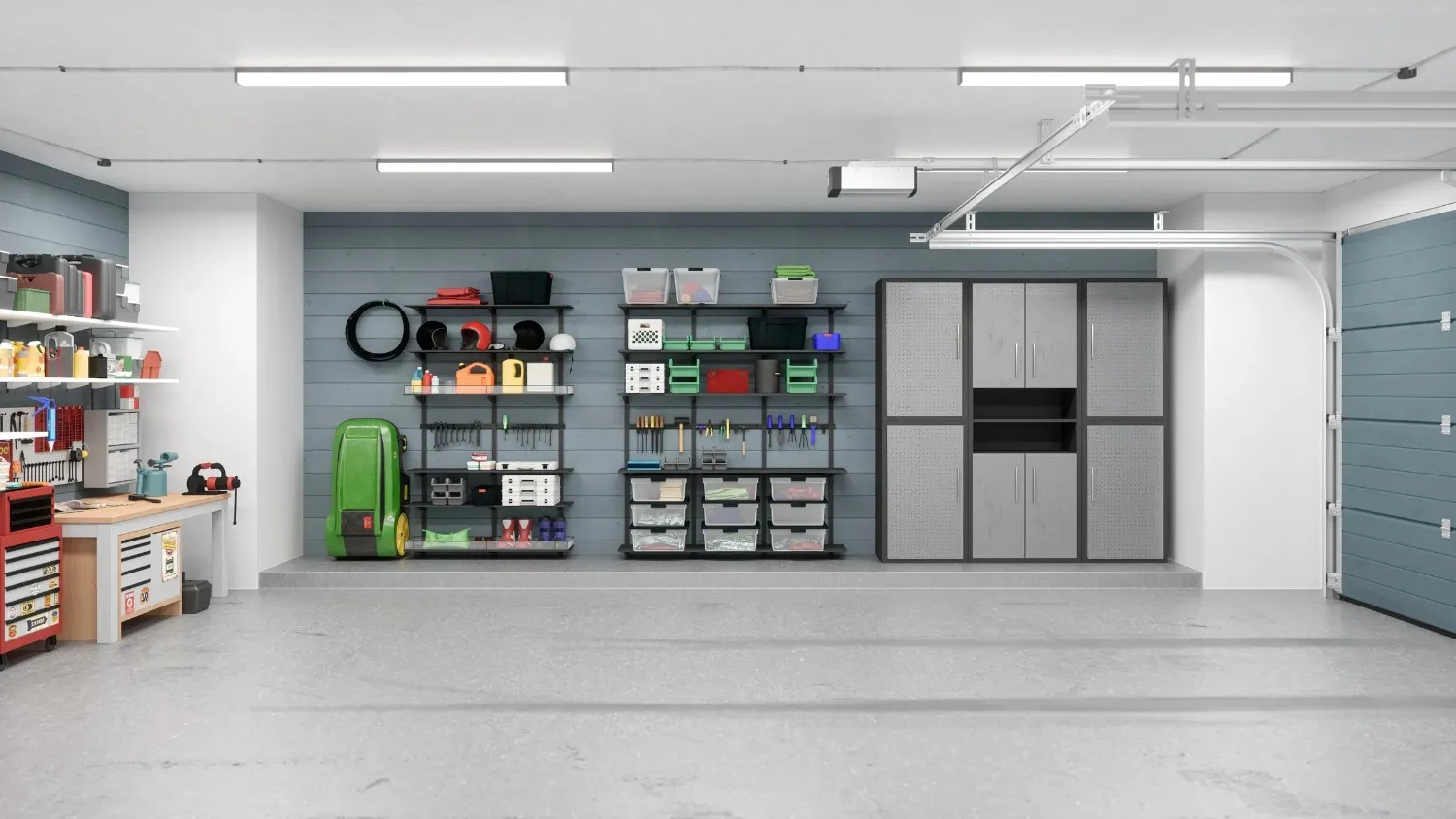 A clean and modern garage interior with two large storage racks, a metal cabinet system, and a workbench, all on a grey floor with a partially open blue garage door.