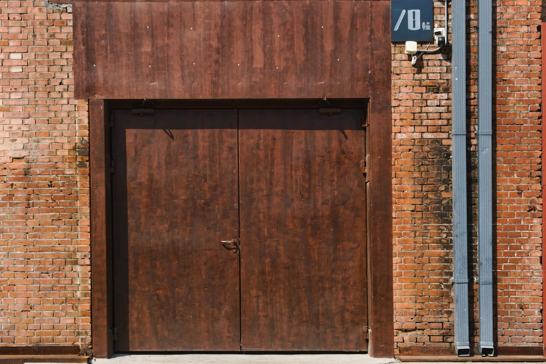 The Great Garage Door Debate: Choosing Between Steel, Wood, and Aluminum