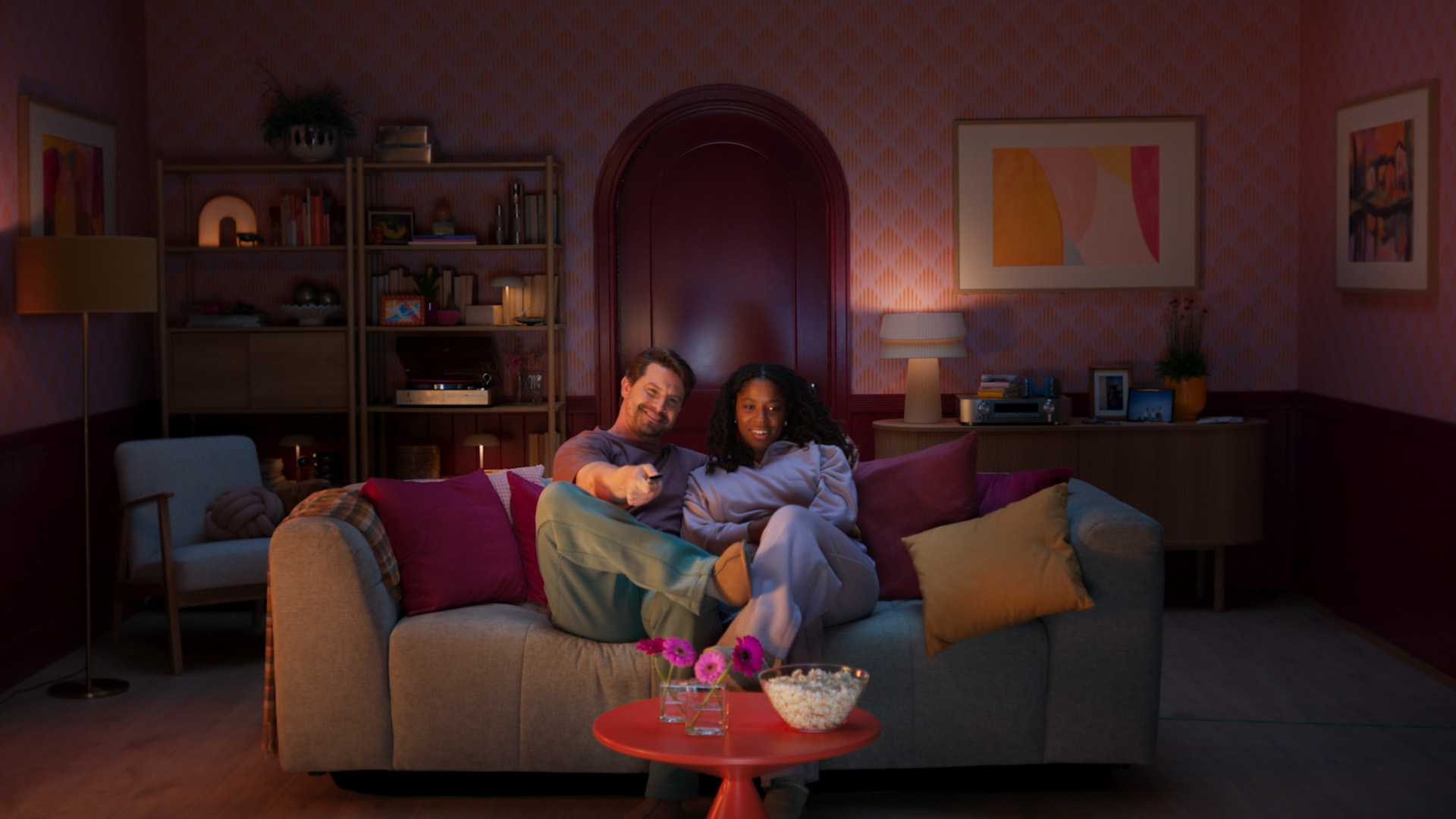 A couple sitting in a couch
